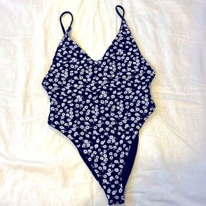 One piece Black and white Floral swim suit.